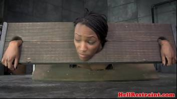 Bound black sub in yoke toyed as punishment